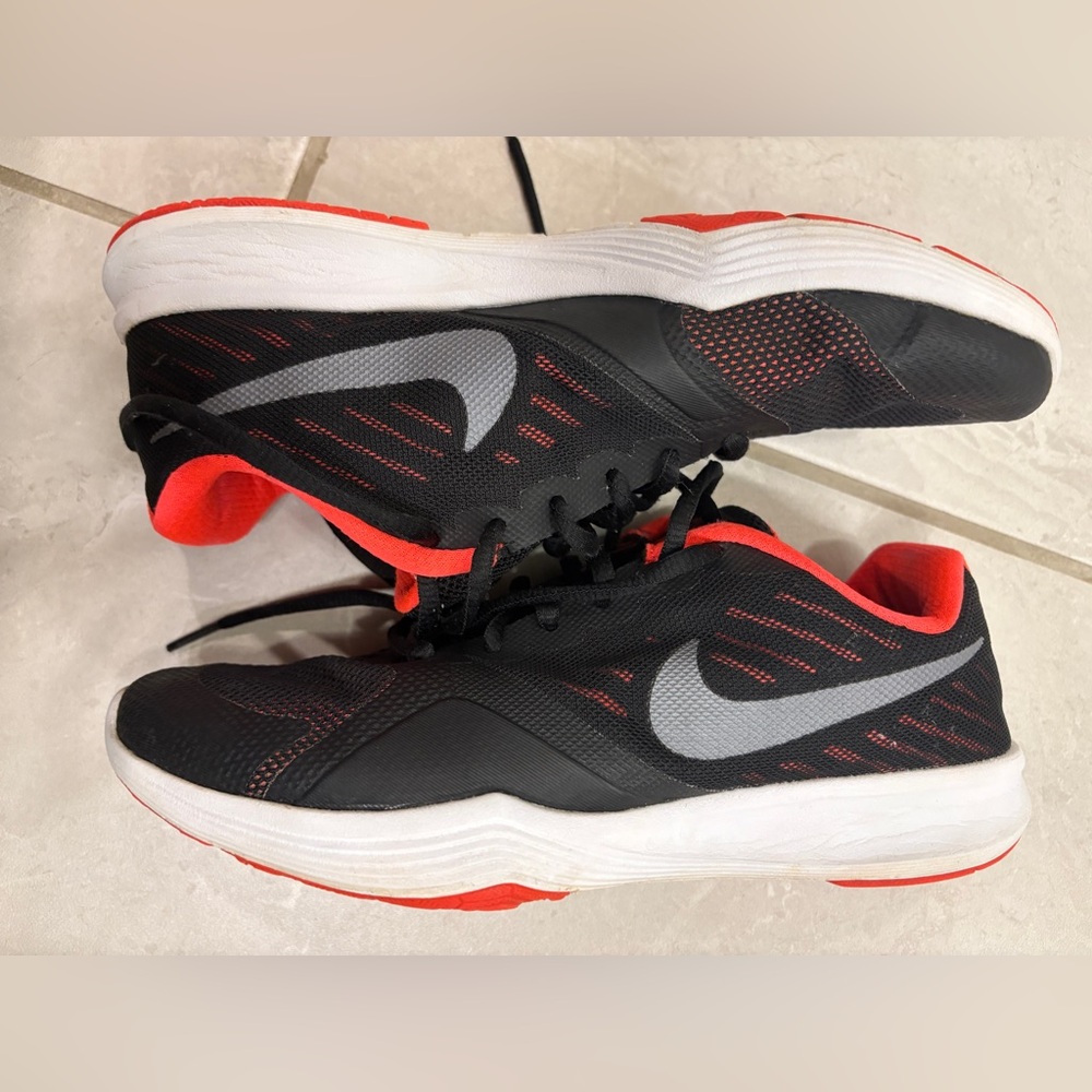 Nike Women’s Black and Neon Orange Running Shoes